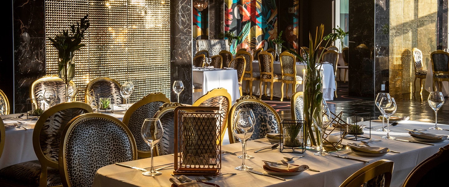 The luxurious ambiance of Eclipse Restaurant, enhanced by the late afternoon sun