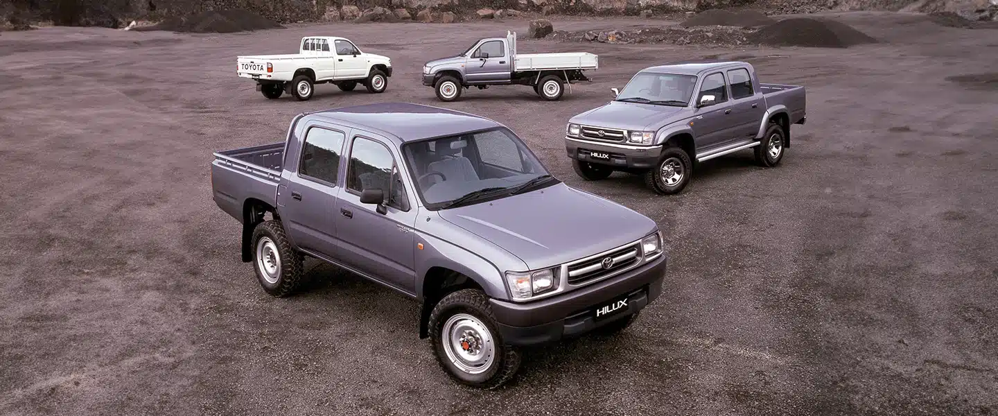 A few sixth-generation Toyota Hilux, single and double cabs.