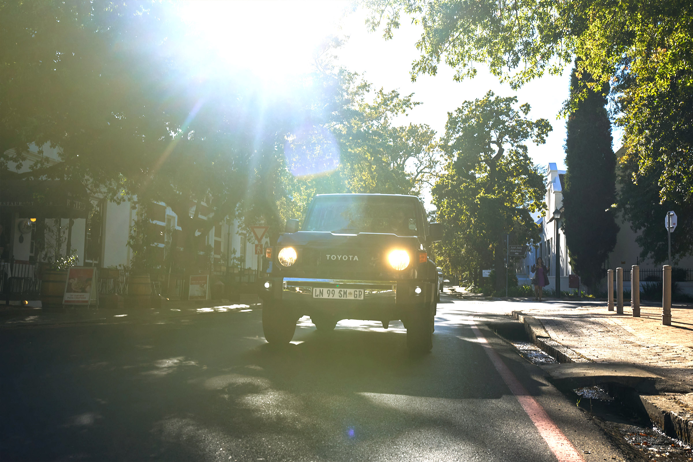 The Land Cruiser 76 Station Wagon driving through Stellenbosch streets